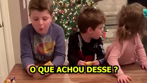 AMERICAN CHILDREN TASTING BRAZILIAN SWEETS