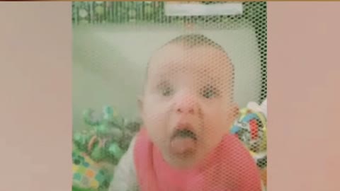 funny baby counts with her head