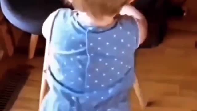 Cute baby dancing with her mother