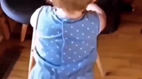 Cute baby dancing with her mother