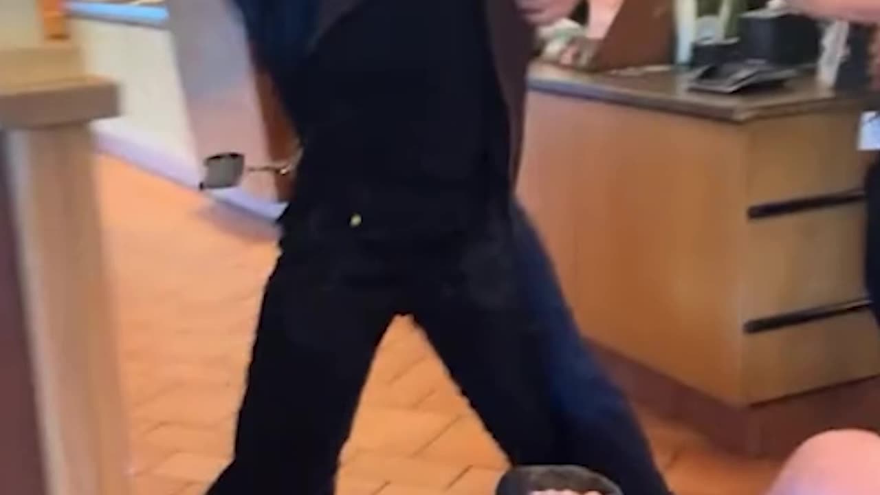 Employee strikes Karen with a pan