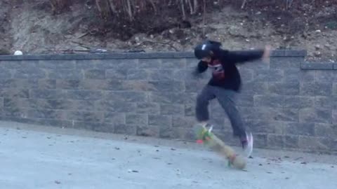 Driveway skate trick land wrist