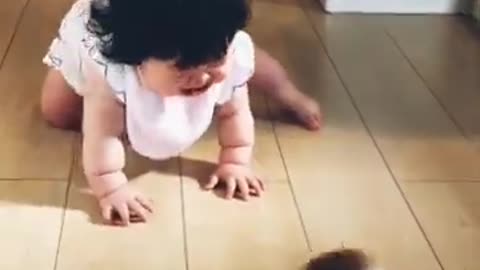 Cute baby frightened by a small toy🤣😅😀