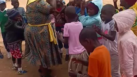 Teacher pupils dance party