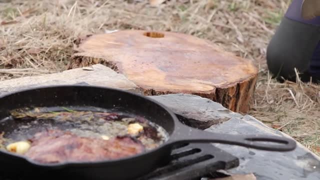 Fried steak with thyme in the open air