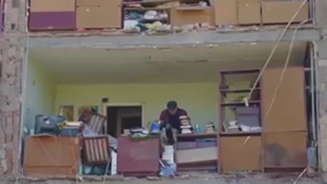 Resident of Kiev collects his belongings left in the apartment