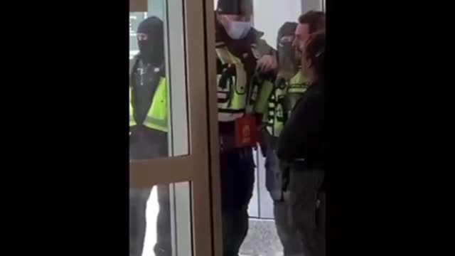 Jackbooted Masked Terror-Police surrounding the Iconic Cafe in Ottawa