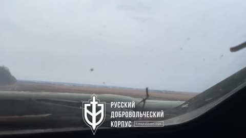 Anti-Putin Rebels Riding Around Belgorod in Russian APC