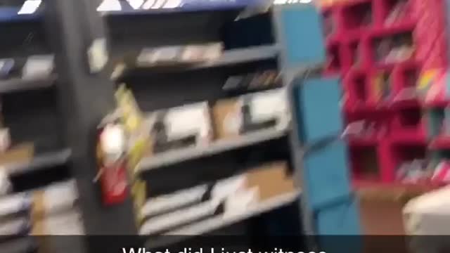 Guy climbs on top of shelf at toy store and jumps into barbie doll display