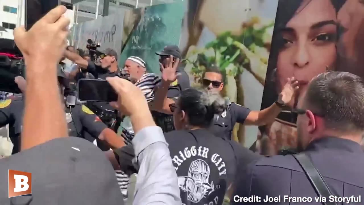 Lunatic protestor runs in front of President Trump's armored limo in Miami.