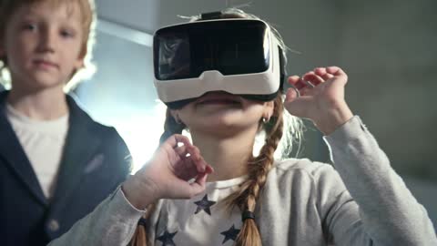 A Girl Wearing A Virtual Reality Headset