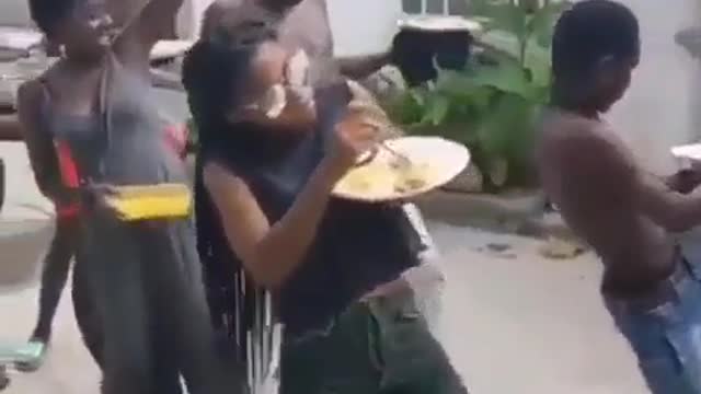 Family Dancing Over Food