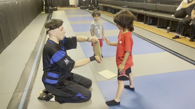 Student breaks board in 3 pieces with 1 palm strike