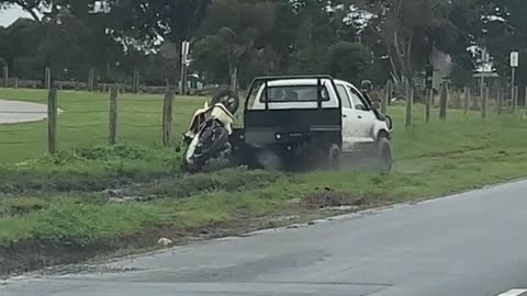 Scooter Takes a Tumble from Truck