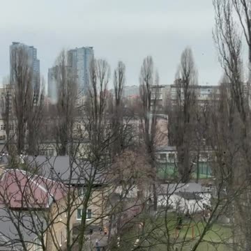 Children are running to a bomb shelter during explosions in Kyiv