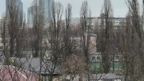 Children are running to a bomb shelter during explosions in Kyiv