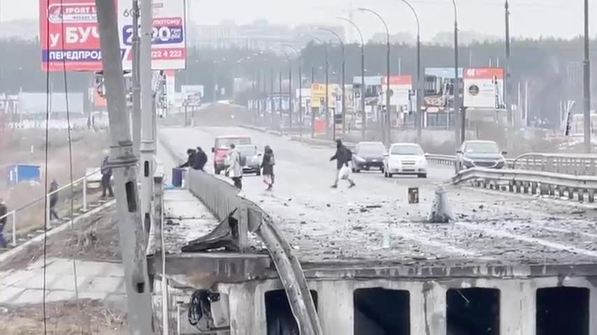 Ukrainians Cross Destroyed Bridge to Evacuate