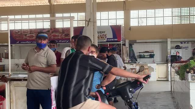 Guy Loses Control of Motor Bike While Showing Off in Meat Market