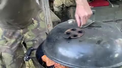 A delicious dinner is one of the few reasons for joy on the front line