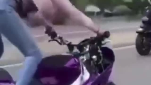 Don't underestimate a beautiful woman's motorcycle skills