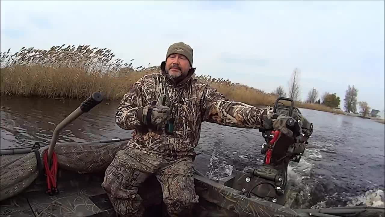 18ft Excel F86 Boat with Mud Buddy through Ice