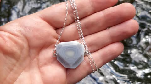 Botswana-Agate Sterling silver Pendant with water running in the background