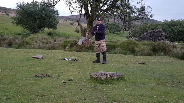 Testing the ground before setting up the tent. DARTMOOR.