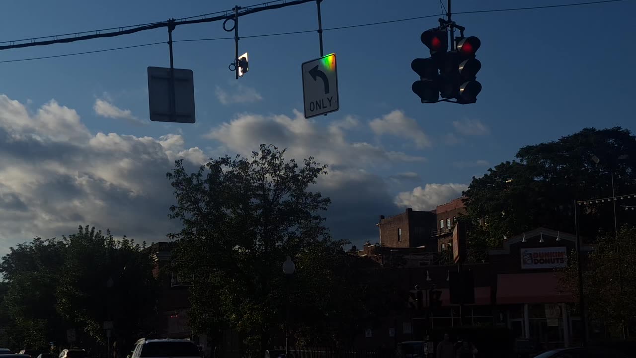 Catching a rainbow on a street sign!?(screen darkened)