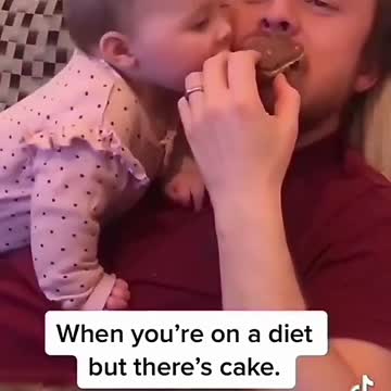 Cute baby tried to eat daddies food it is very funny