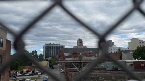 A created covering with breaks showing the real blue sky