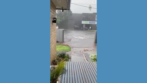 Floodwater inundates Melbourne streets.