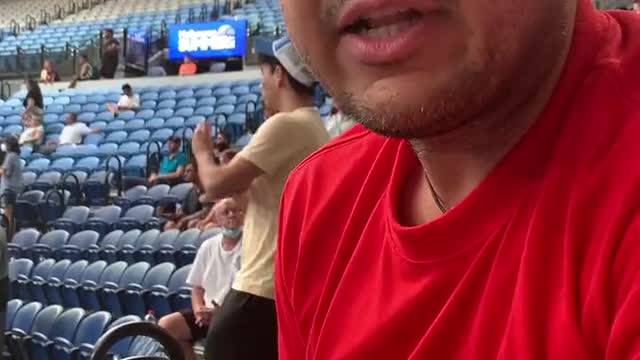 Melbourne Australia - Couple advised not allowed to have a sign of Novak Djokovic at Rod Laver Arena