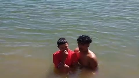 Olioni baptizing Jeff