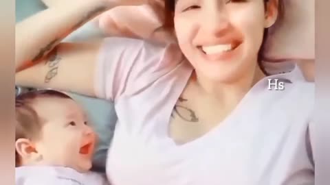 Adorable baby looking at her mom, cute baby