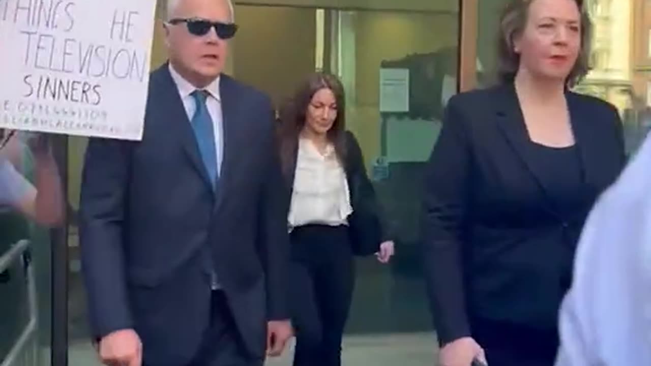 Huw Edwards leaves court after pleading guilty