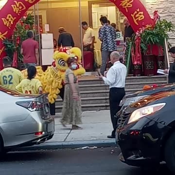 Dragon Dance in front of Chinese Restaurant