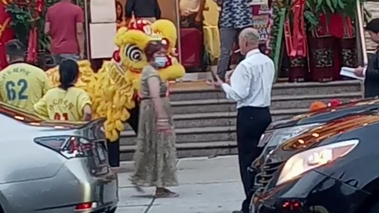 Dragon Dance in front of Chinese Restaurant