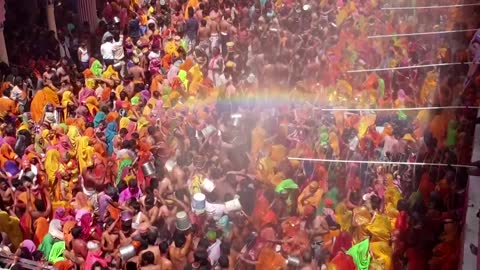 Women beat, tear off men's clothes in Holi ritual