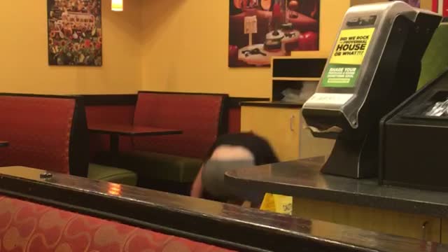 Guy backflip restaurant trashcan hits head