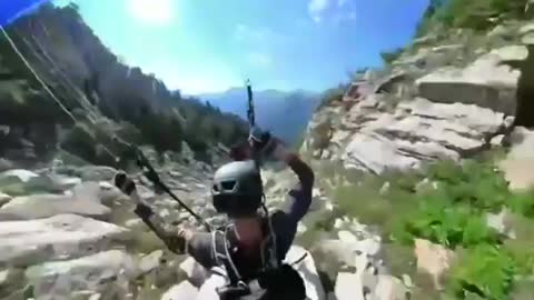Insane paragliding skills.