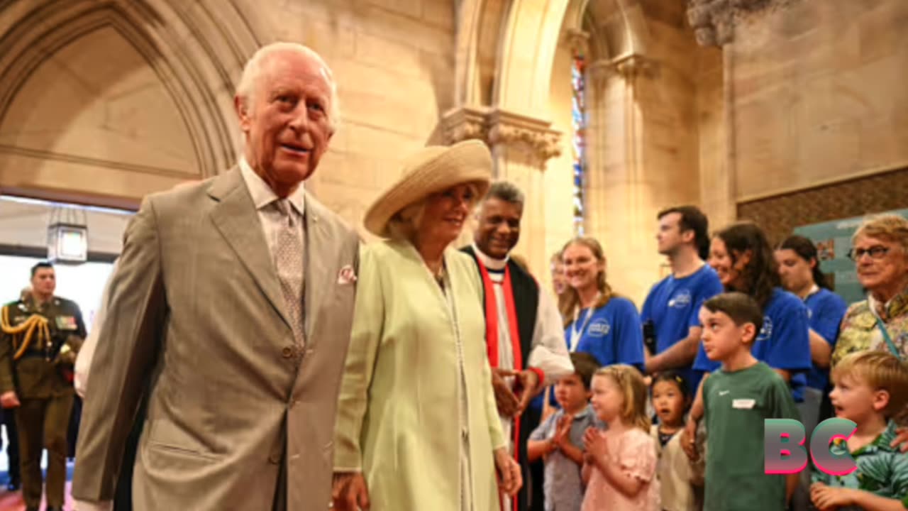 Children greet King Charles III and Queen Camilla outside a Sydney church