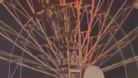 More than 20 people were injured when a Ferris wheel caught fire Saturday evening