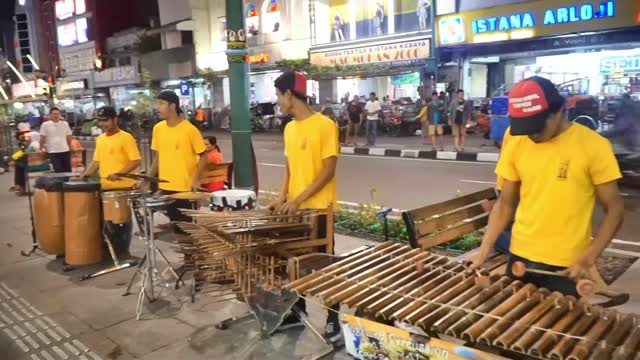 traditional music made by bamboo (Angklung) - Street Performance