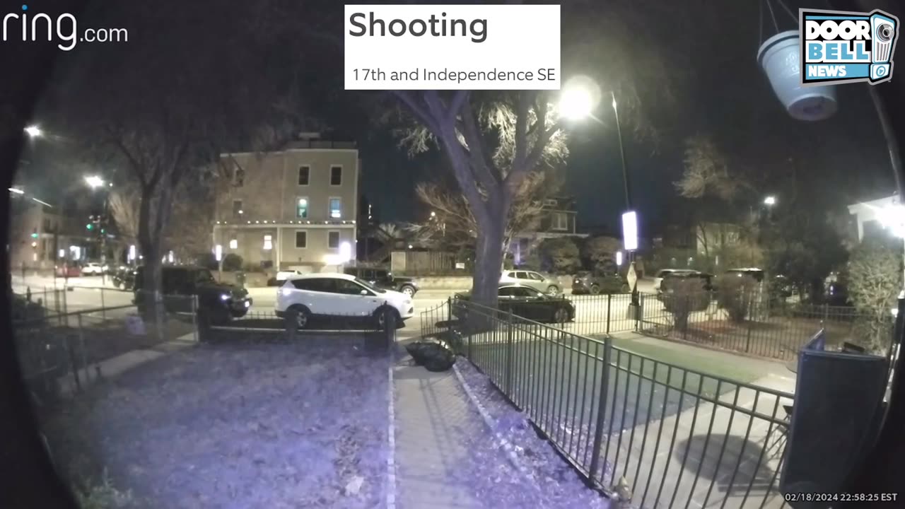 white car shooting at a group of people who returned fire