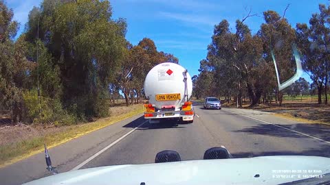 Semi Swerves Trying to Cut off Car