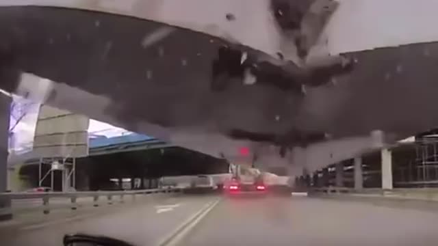 Bridge breaks in front of vehicle