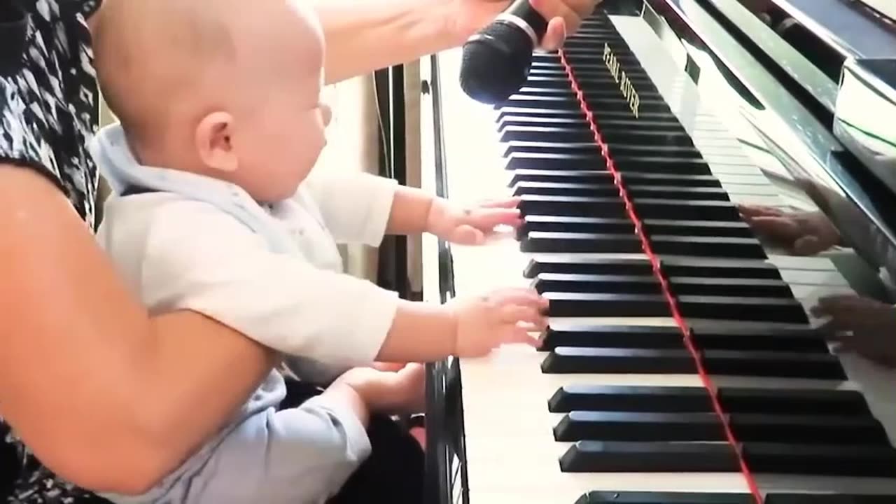 kid playing piano