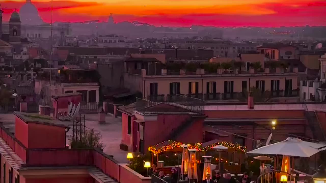 COLORFUL CRIMSON SUNSET IN ROME ITALY