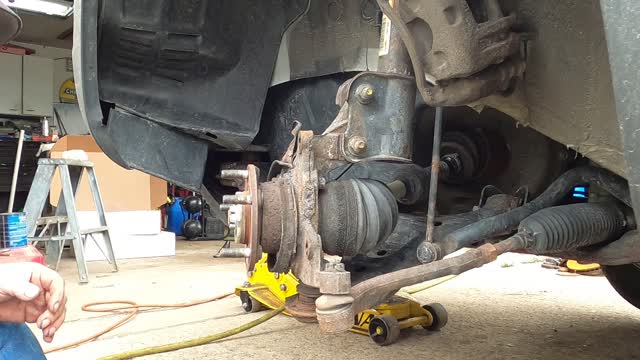 Part 1 Replacing lower control arm 2013 Kia Sorrento.