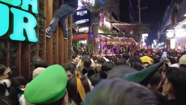 This man trying to escape from a crowd at the south korea Halloween stampede